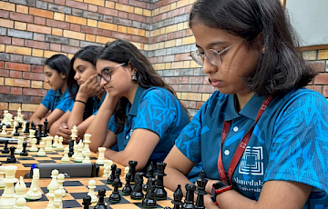 Women’s Chess Team Wins Gold